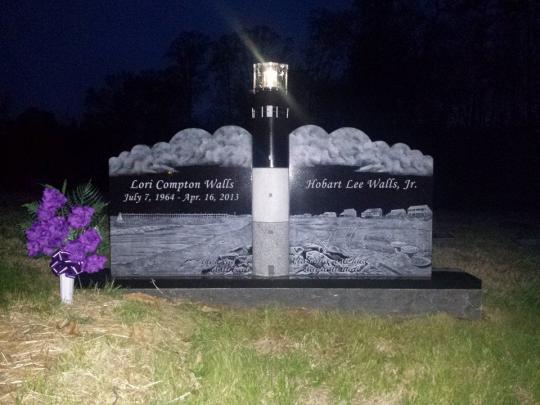 South Boston Memorials - Custom granite and stainless steel lighthouse memorial by South Boston Memorials.  Patterned after the lighthouse at Oak Island, NC with a working solar light that can be accessible for maintenance.
